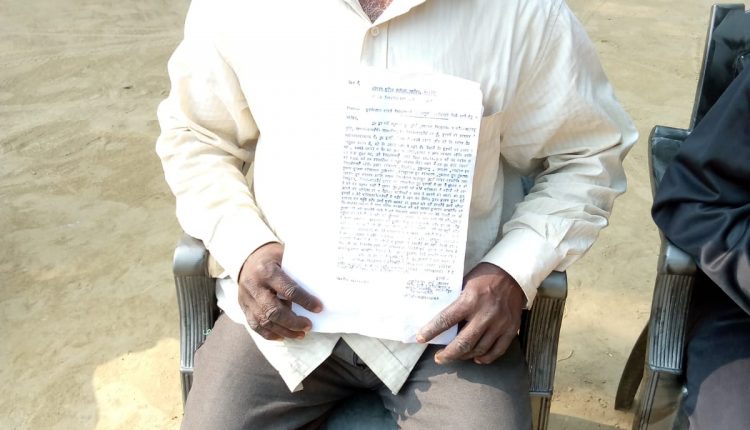 Despite the pending suit in the court, who is responsible for illegal occupation of land with the connivance of the local police.