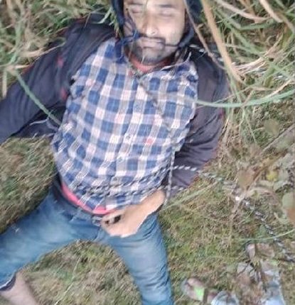 Dead body of a young man found lying in a pit