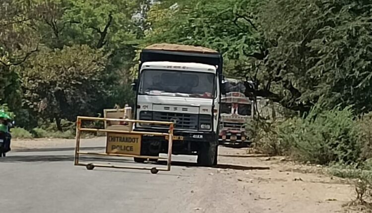 Question mark on traffic system, heavy vehicles being passed at no entry