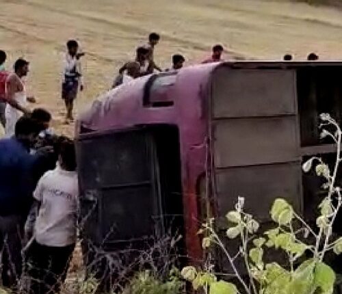 Twelve people injured when bus full of tourists overturns