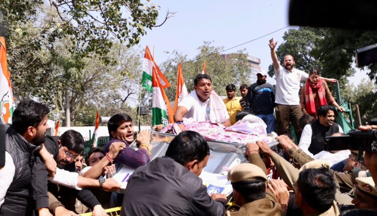 Youth Congress workers protest on Adani issue