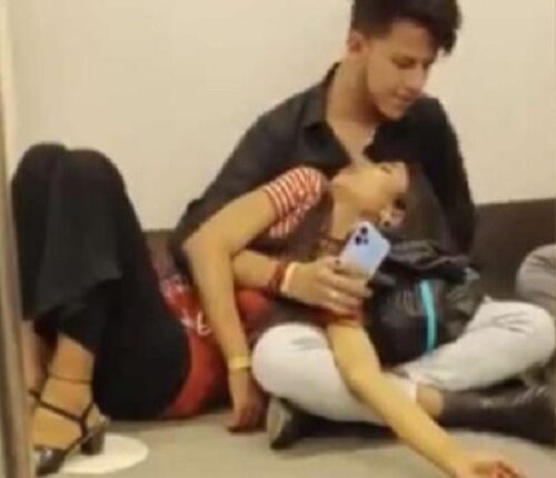 Video of a boy kissing a girl openly on the floor in Delhi Metro goes viral