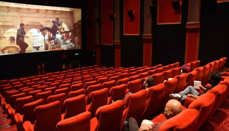 The manager beat up the youths who went to watch the film in the cinema hall